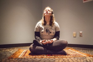 MaryRose Scarpelli searches for inner peace in the college’s meditation room. Photo by Daniel De Zamacona