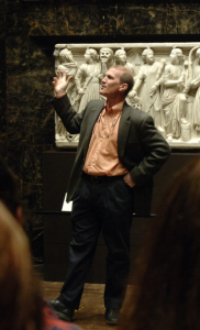 Michael Robertson addresses a gathering of students as he talks about an art piece on display at the Nelson Atkins Muesum.Photo courtesy of the college