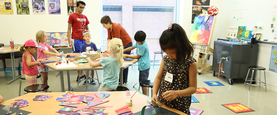 Young children participating in art activities