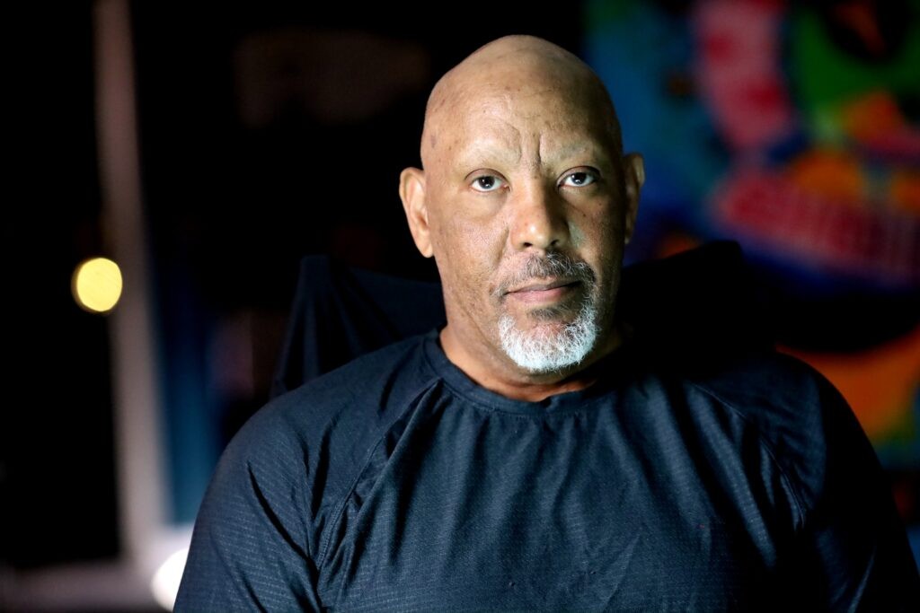 Man with a beard wearing a dark shirt