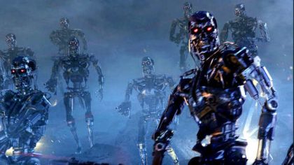 scary scene of red-eyed robots emerging from fog with one very clear in the foreground glaring at the viewer